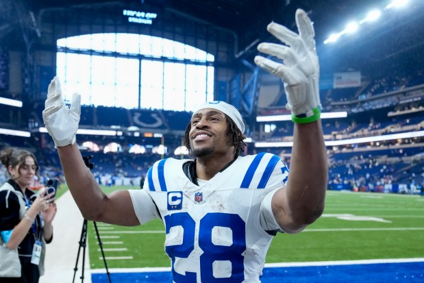 Indianapolis Colts running back Jonathan Taylor (28) celebrates the team's win against the Tennessee Titans after an NFL football game Sunday, Dec. 22, 2024, in Indianapolis. (AP Photo/Michael Conroy)