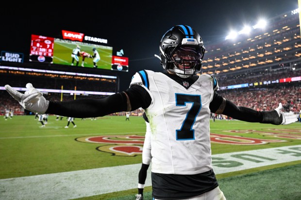 Carolina Panthers safety Tre'von Moehrig reacts after an interception against the San Francisco 49ers in the first half of an NFL football game, Monday, Nov. 24, 2025, in Santa Clara, Calif. (AP Photo/Eakin Howard)