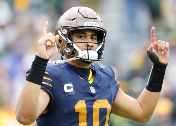 Green Bay Packers quarterback Jordan Love (10) on the field before an NFL game against the Carolina Panthers, Sunday, Nov. 2, 2025, in Green Bay, Wis. (AP Photo/Jeffrey Phelps
