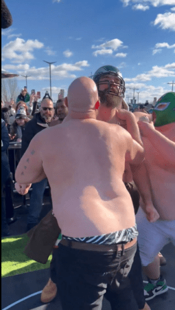 Jason Kelce celebrates his Belly Bucking contest in the parking lot of Lincoln Financial Field. 