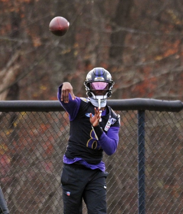 Ravens quarterback Lamar Jackson works out during practice at Under Armour Performance Center. (Kenneth K. Lam/Staff)