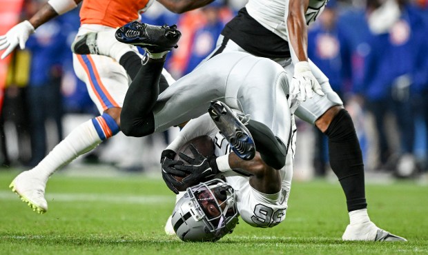 Kyu Blu Kelly (36) of the Las Vegas Raiders intercepts...