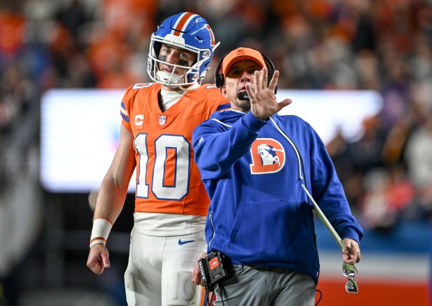 Head coach Sean Payton of the Denver Broncos speaks to...