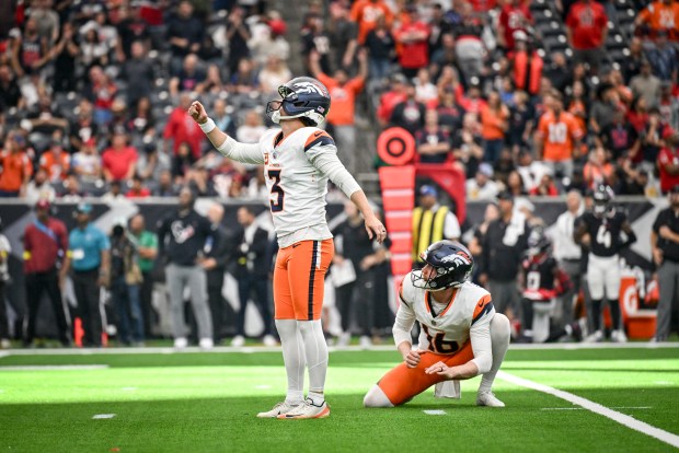 Wil Lutz (3) of the Denver Broncos watches alongside Jeremy Crawshaw (16) as his winning field goal splits the uprights during the fourth quarter of the Broncos' 18-15 win over the Houston Texans at NRG Stadium in Houston, Texas on Sunday, Nov. 2, 2025. (Photo by AAron Ontiveroz/The Denver Post)