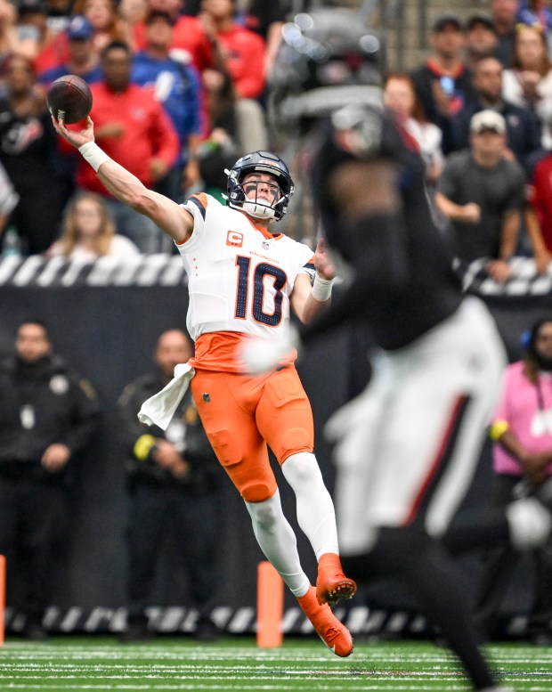 Bo Nix (10) of the Denver Broncos throws deep against the Houston Texans during the second quarter at NRG Stadium in Houston, Texas on Sunday, Nov. 2, 2025. (Photo by AAron Ontiveroz/The Denver Post)