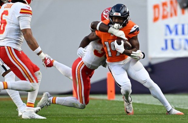 Marvin Mims Jr. (19) of the Denver Broncos adds a few yard after a catch at Empower Field at Mile High on Nov. 16, 2025. The Denver Broncos took on the Kansas City Chiefs during week 11 of the 2025-26 NFL season. (Photo by RJ Sangosti/The Denver Post)