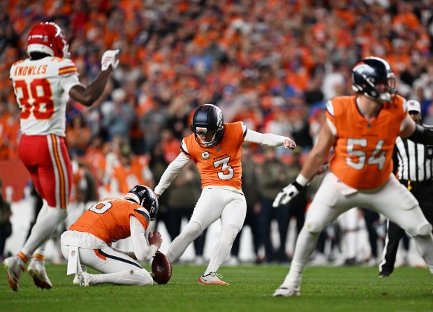 Wil Lutz (3) of the Denver Broncos, center, kicks the winning field goal against the Kansas City Chiefs at Empower Field at Mile High on Nov. 16, 2025. (Photo by RJ Sangosti/The Denver Post)