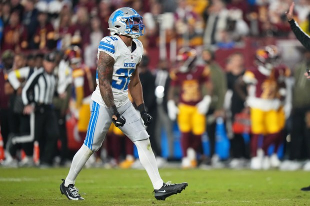 Detroit Lions defensive back Brian Branch (32) celebrates after sacking...