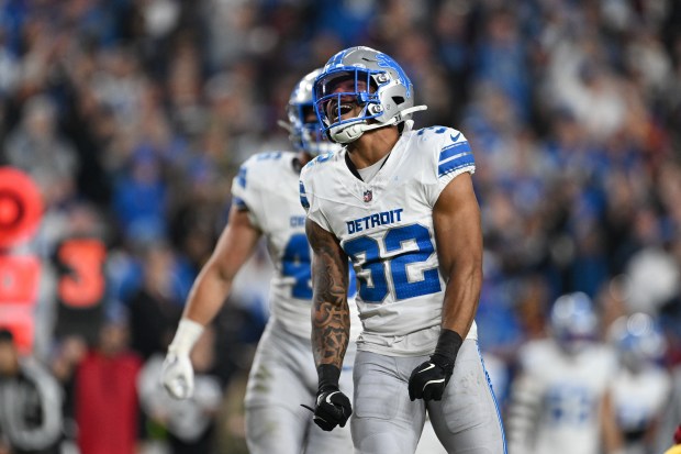 Detroit Lions safety Brian Branch (32) celebrates his sack of...