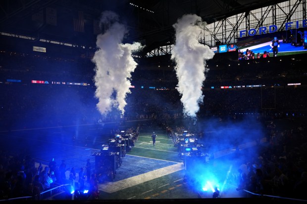 Detroit Lions guard Graham Glasgow (60) takes the field before...