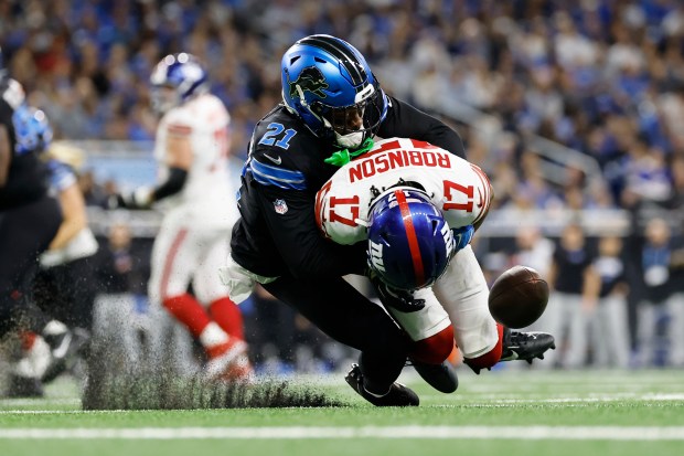 New York Giants wide receiver Wan'Dale Robinson (17) loses the...