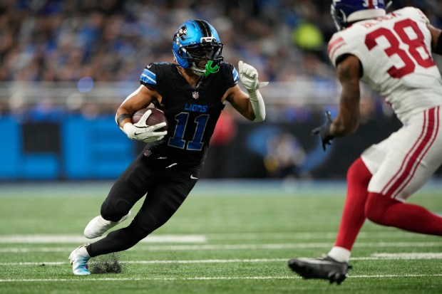 Detroit Lions wide receiver Kalif Raymond (11) runs as New...