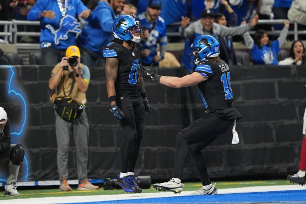 Detroit Lions running back Jahmyr Gibbs (0) celebrates his touchdown...