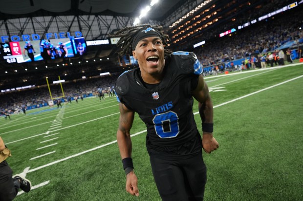 Detroit Lions running back Jahmyr Gibbs (0) celebrates the Lions'...