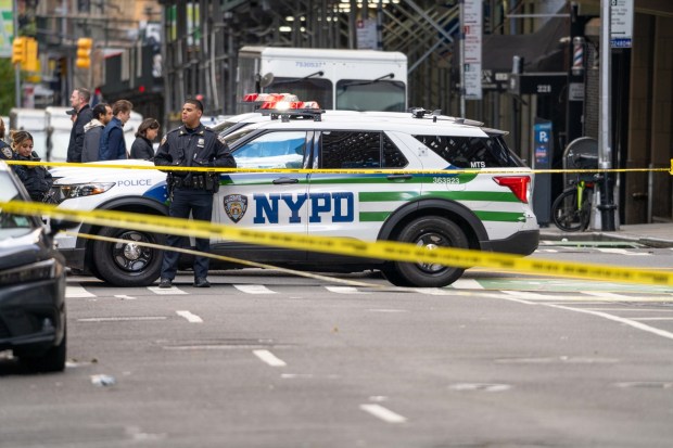 Police investigate after New York Jets cornerback Kris Boyd was shot in the abdomen on West 38th Street between Broadway and 7th Avenue in Manhattan on Sunday, Nov. 16, 2025.
