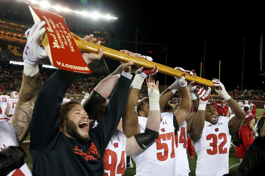 What do an axe, a bucket and a cannon have in common? Meet the rivalry trophies of college football – Hartford Courant