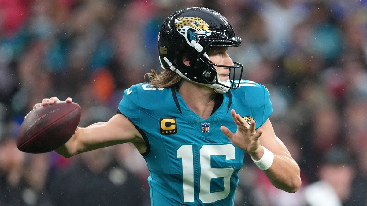 Jacksonville Jaguars quarterback Trevor Lawrence (16) passes the ball against the Los Angeles Rams during the first half of an NFL International Series game at Wembley Stadium.