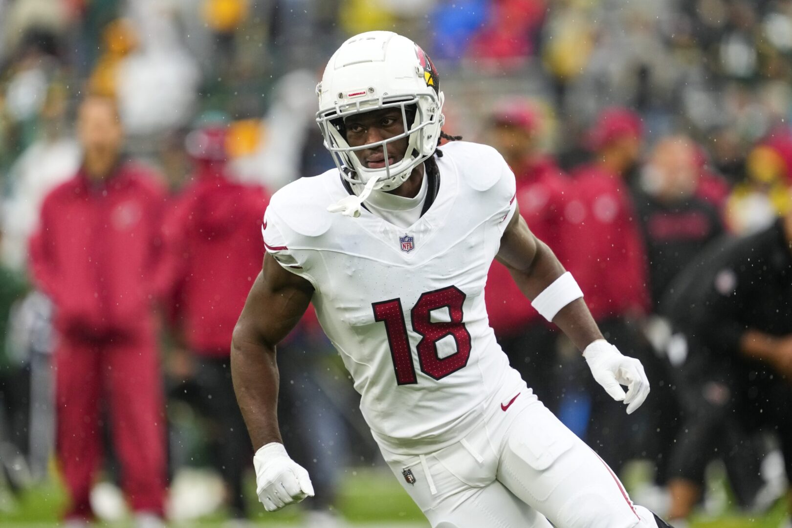 Oct 13, 2024; Green Bay, Wisconsin, USA; Arizona Cardinals wide receiver Marvin Harrison Jr. (18) during warmups prior to the game against the Green Bay Packers at Lambeau Field. Mandatory Credit: Jeff Hanisch-Imagn Images