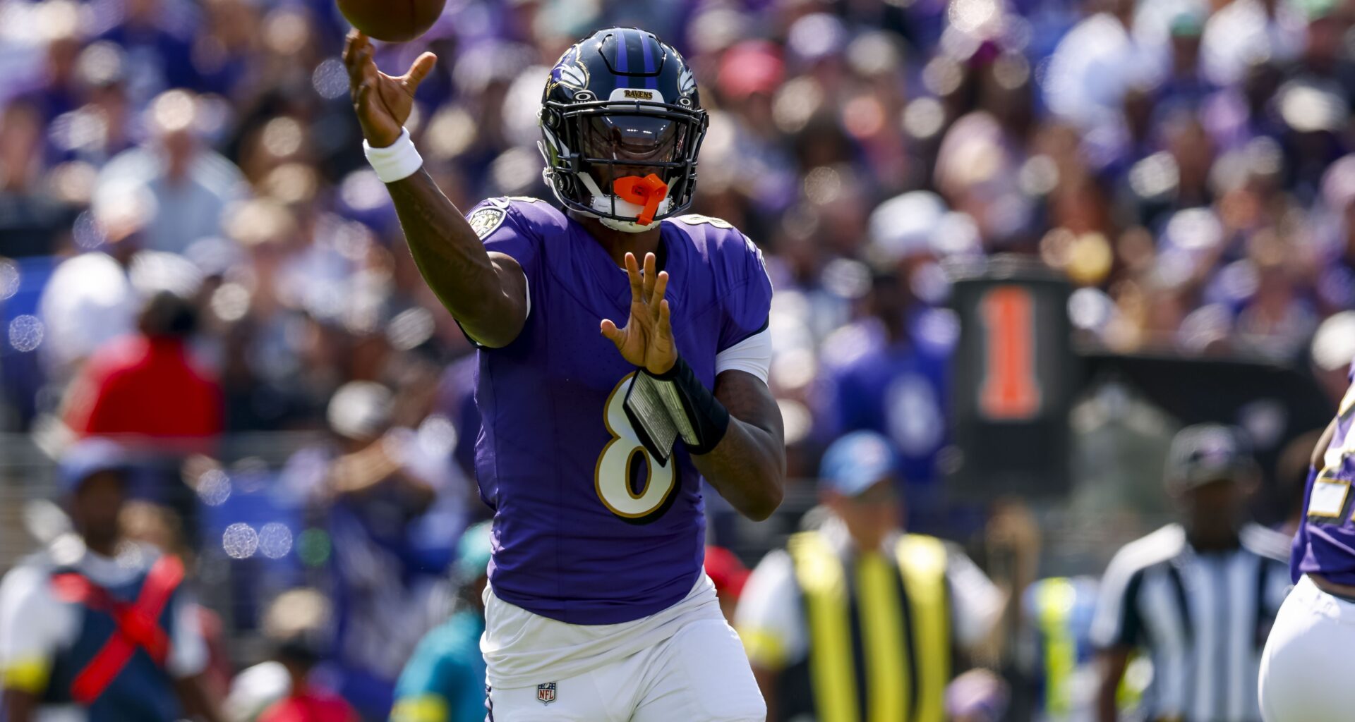 Ravens star Lamar Jackson looks to throw against the Browns during the 2025 NFL season.