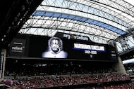A view of the video board during a moment of silence in honor of Marshawn Kneeland formally...