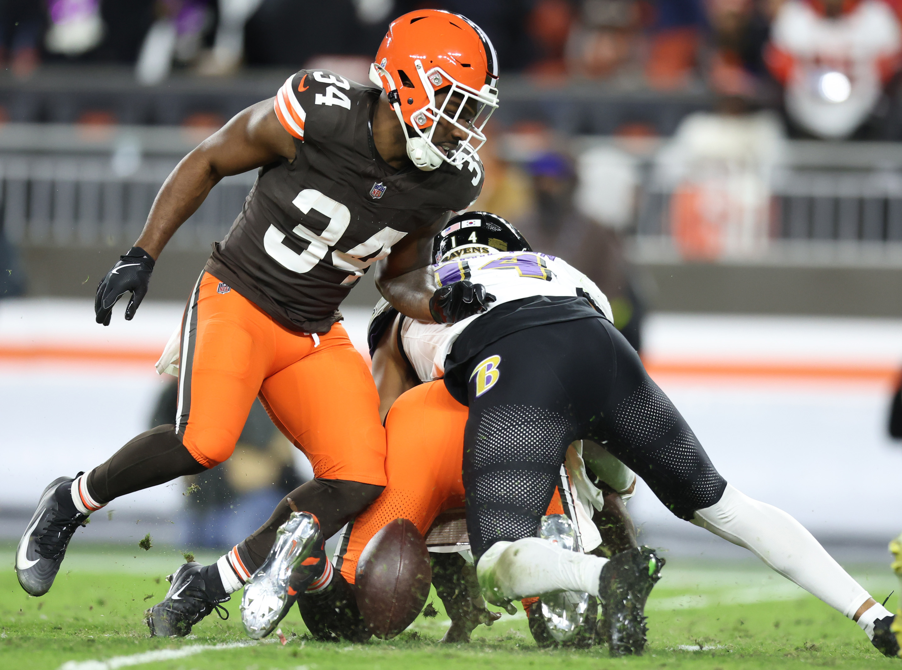 Cleveland Browns quarterback Shedeur Sanders fumbles the football by a sack from Baltimore Ravens safety Kyle Hamilton in the third quarter.