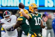 Green Bay Packers' Jordan Love throws during the second half of an NFL football game against...