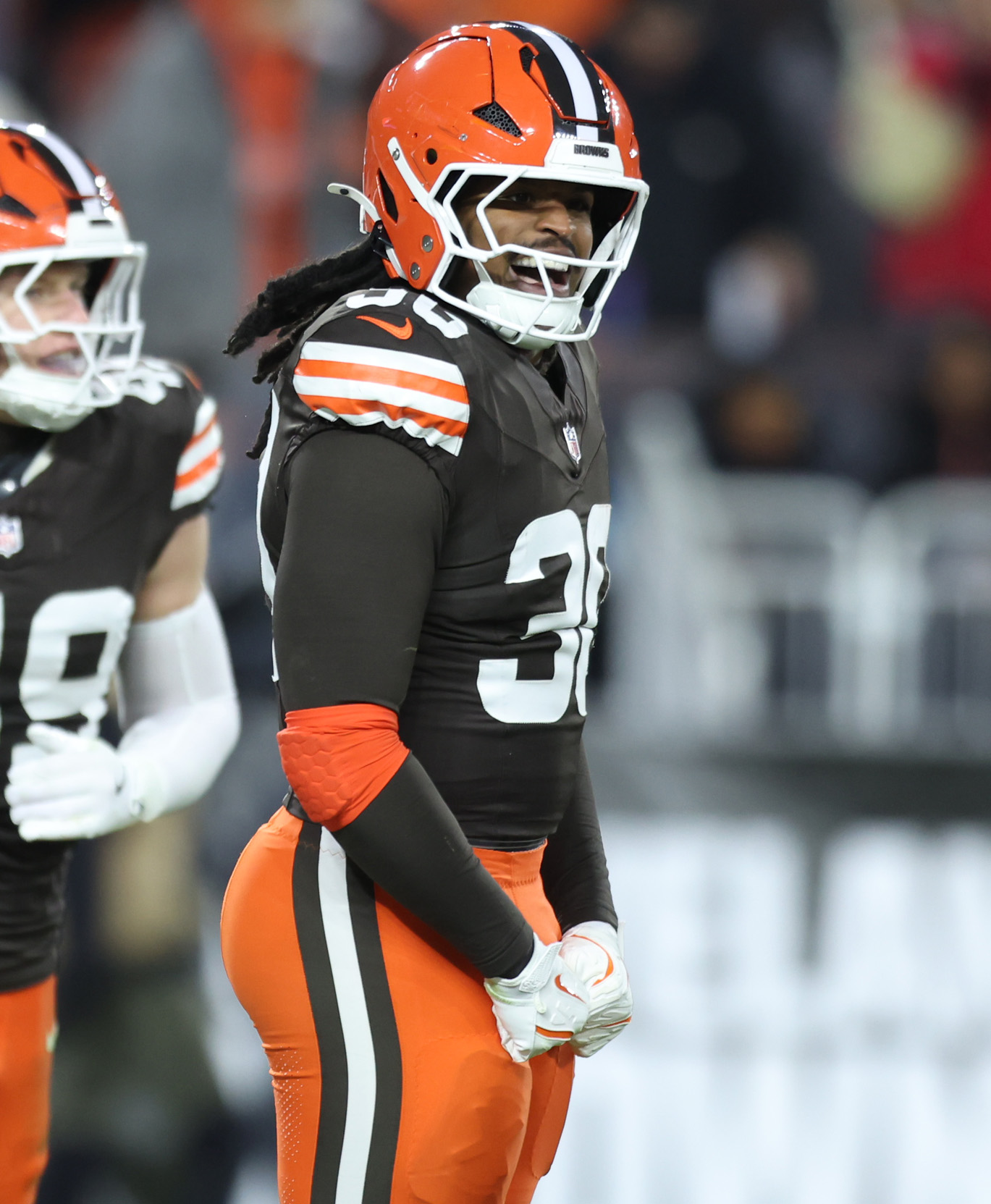 Cleveland Browns linebacker Devin Bush celebrates his pick six in the first half against the Baltimore Ravens.  