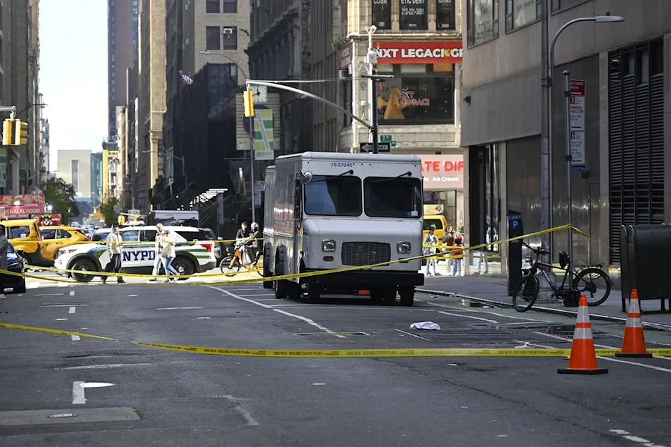 Kyle Mazza/Anadolu via Getty NYPD officers maintain a security cordon after New York Jets NFL cornerback Kris Boyd was shot