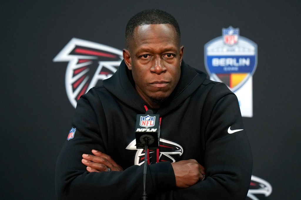 Atlanta Falcons head coach Raheem Morris speaks at a news conference.