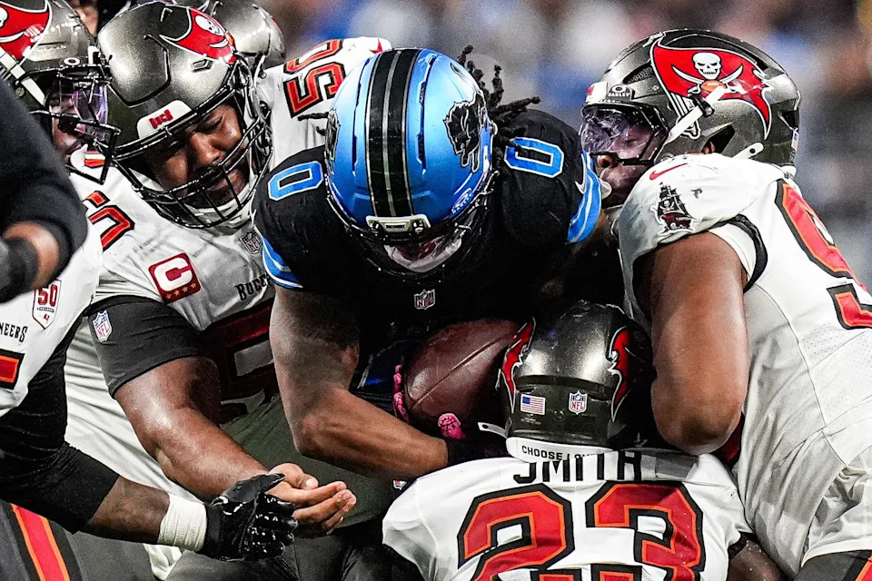 Detroit Lions running back Jahmyr Gibbs (0) runs against Tampa Bay Buccaneers during the second half at Ford Field in Detroit on Monday, Oct. 20, 2025.