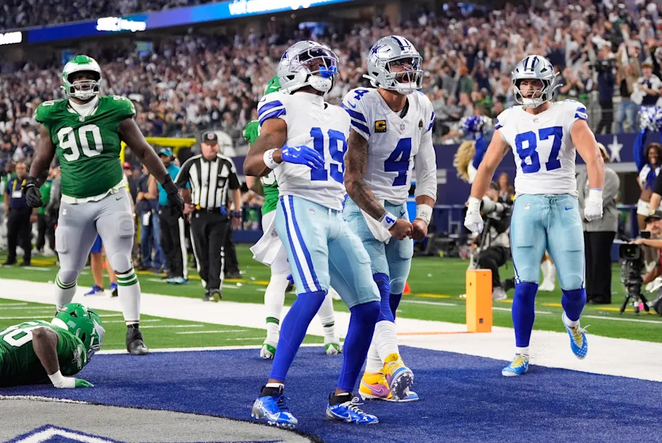Dak Prescott and the Cowboys celebrate his game-tying touchdown run late in the game.
