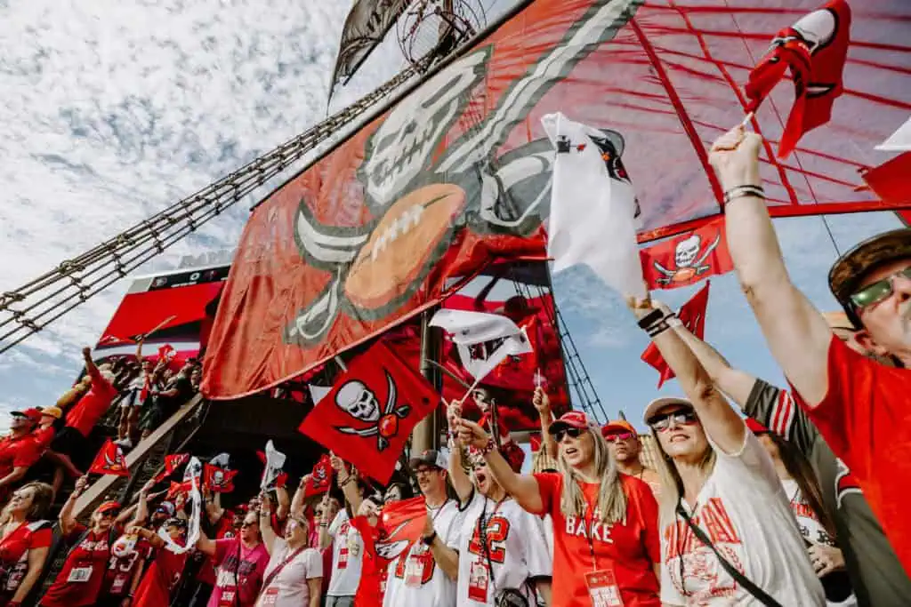 Fans cheering at a football game