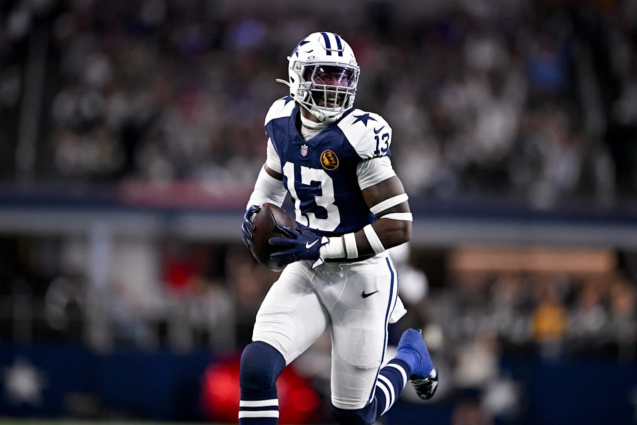 Dallas Cowboys linebacker DeMarvion Overshown (13) returns an interception for a touchdown against the New York Giants during an NFL football game in Arlington, Texas, Thursday, Nov. 28, 2024. (AP Photo/Jerome Miron)