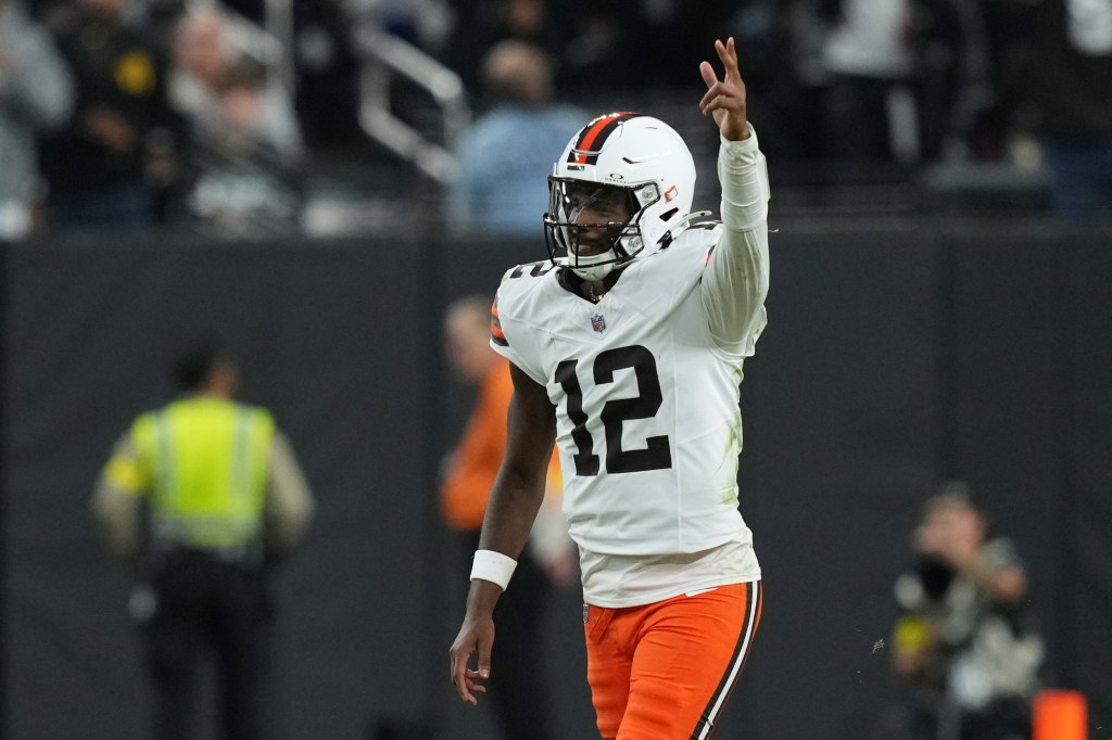 Cleveland Browns quarterback Shedeur Sanders (12) celebrates a touchdown.