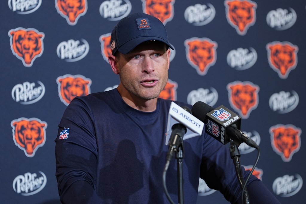 Chicago Bears coach Ben Johnson speaking at a press conference.