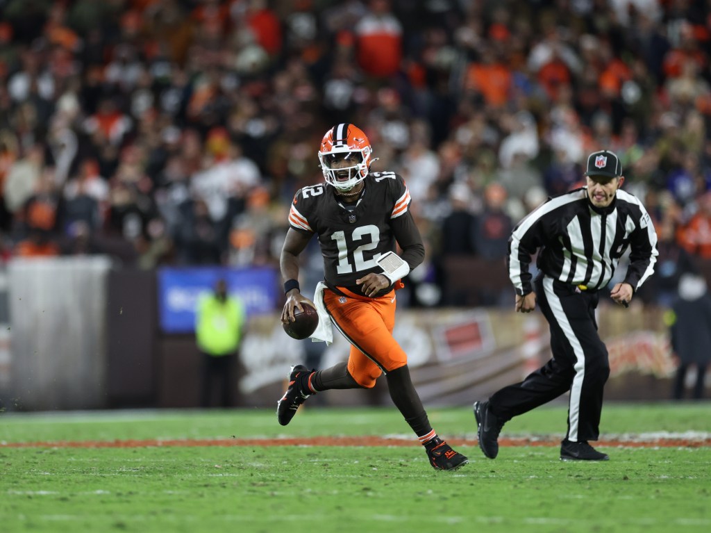 Cleveland Browns quarterback Shedeur Sanders (12) runs with the football during the fourth quarter.