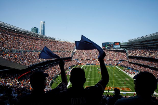 Fans cheer during the first half of the Bears season opener against the Atlanta Falcons at Soldier Field, Sept. 10, 2017, in Chicago. (Armando L. Sanchez/Chicago Tribune)