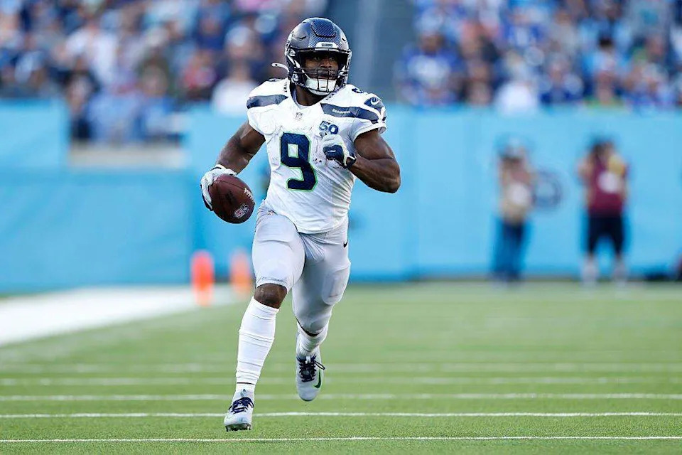 NASHVILLE, TENNESSEE - NOVEMBER 23: Kenneth Walker III #9 of the Seattle Seahawks runs with the ball in the third quarter of the game against the Tennessee Titans at Nissan Stadium on November 23, 2025 in Nashville, Tennessee. (Photo by Johnnie Izquierdo/Getty Images)
