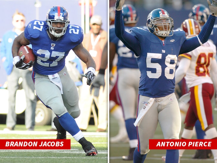 brandon jacobs and Antonio Pierce getty 1