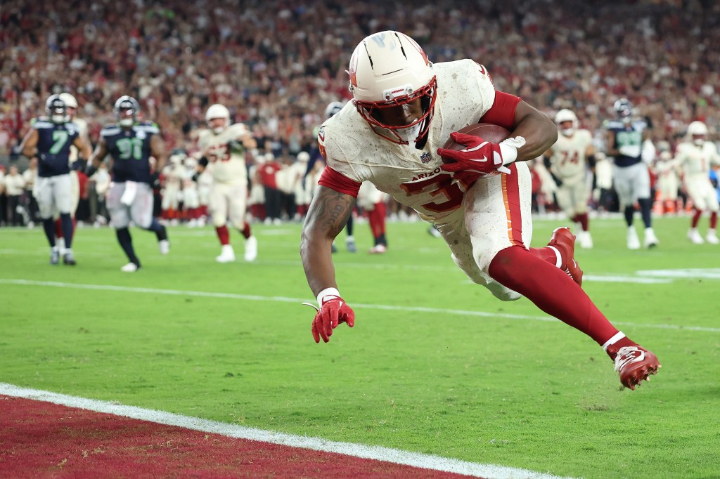 Arizona Cardinals running back Emari Demercado scoring a touchdown.
