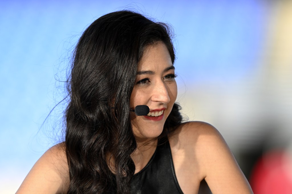 ESPN Broadcaster Mina Kimes speaking with a headset microphone.