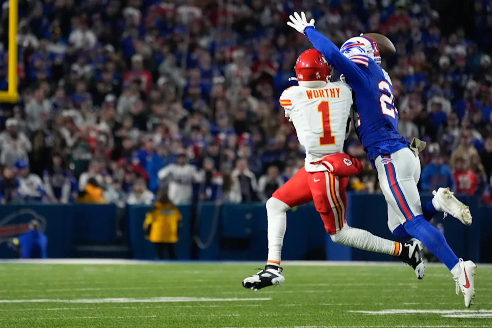 Nov 2, 2025; Orchard Park, New York, USA; Buffalo Bills safety Cole Bishop (24) breaks a pass intended for Kansas City Chiefs wide receiver Xavier Worthy (1) in the second quarter at Highmark Stadium. Mandatory Credit: Gregory Fisher-Imagn Images