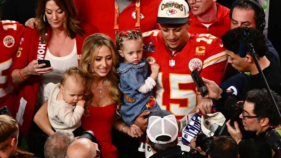 TOPSHOT - Kansas City Chiefs' quarterback #15 Patrick Mahomes with his wife Brittany Mahomes and their children Patrick Bronze and Sterling Skye celebrate winning Super Bowl LVIII against the San Francisco 49ers at Allegiant Stadium in Las Vegas, Nevada, February 11, 2024. (Photo by PATRICK T. FALLON/AFP via Getty Images)