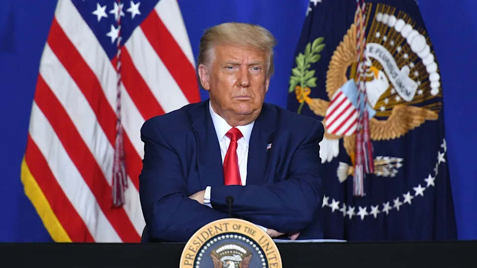 Trump is reportedly willing to leverage his power to ensure that he gets his Trump Stadium, after previously threatening to sabotage the project if the Commanders didn't change their team name. / MANDEL NGAN/AFP via Getty Images