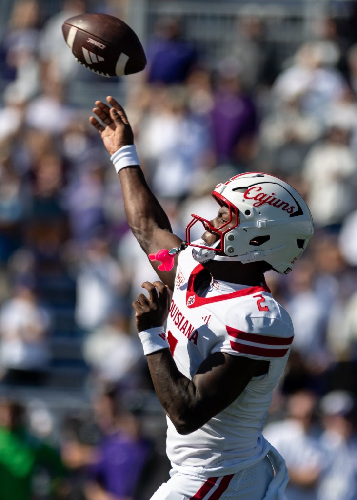Louisiana quarterback Lunch Winfield (2) throws a pass during a college football game against James Madison.