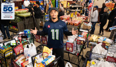 Seahawks Players Spend Day In Community At Food Banks & Drives