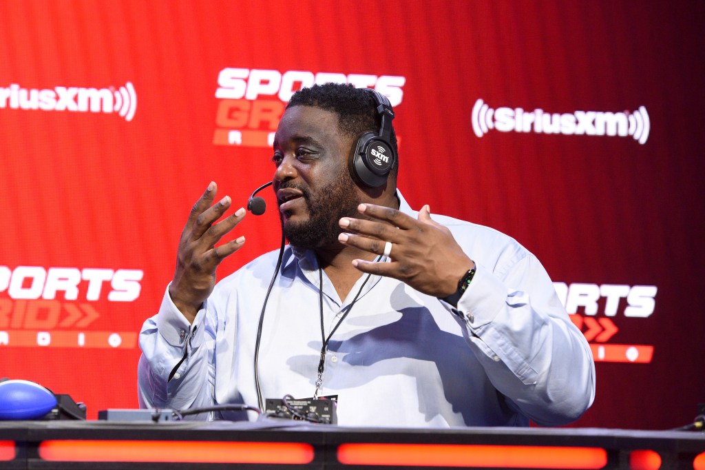 Former NFL player Damien Woody speaking during an interview for SiriusXM at Super Bowl LVI.