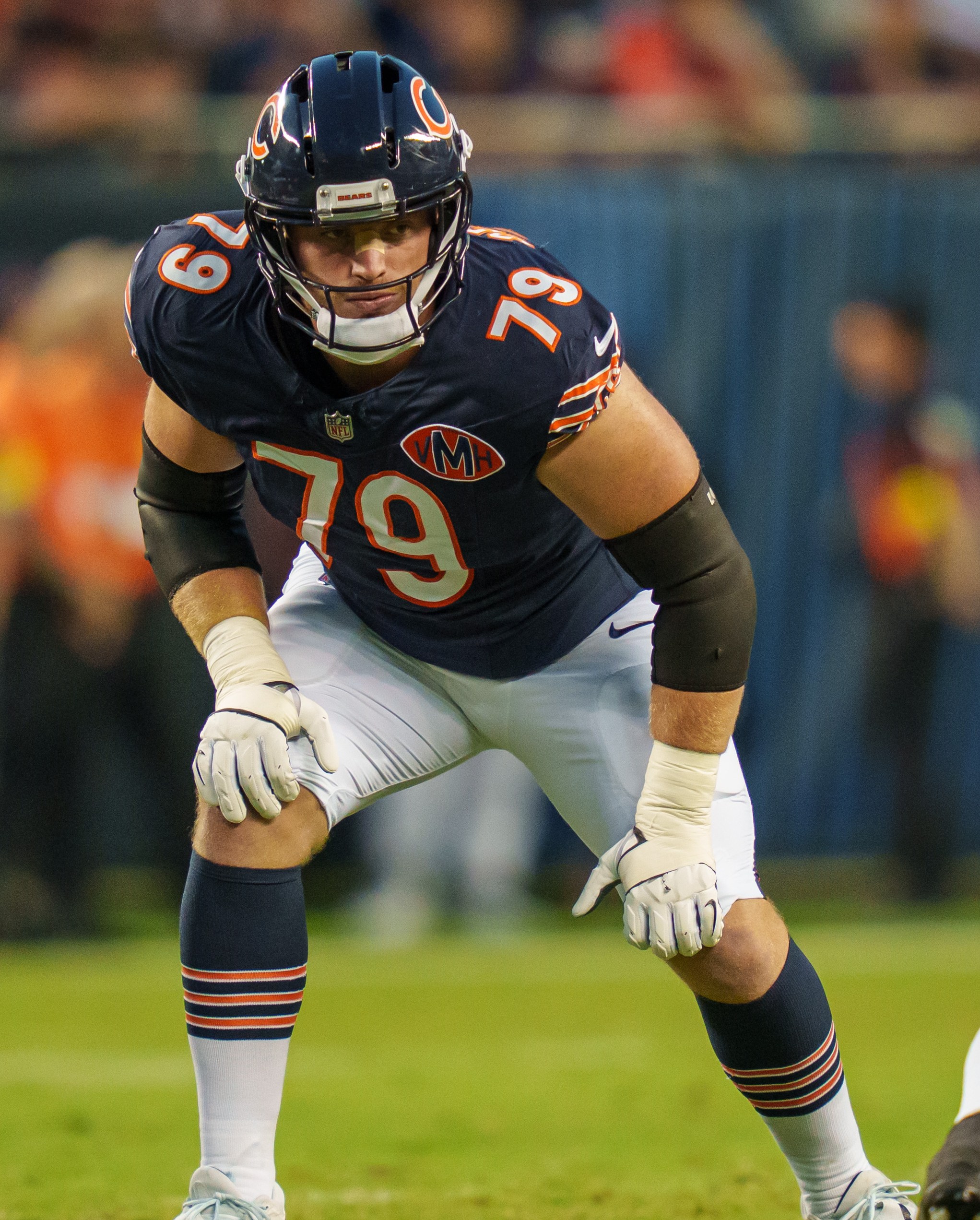 CHICAGO, ILLINOIS - AUGUST 17: Theo Benedet #79 of the Chicago Bears gets set during the first quarter of an NFL preseason football game against the Chicago Bears at Solider Field on August 17, 2025 in Chicago, Illinois. (Photo by Todd Rosenberg/Getty Images)