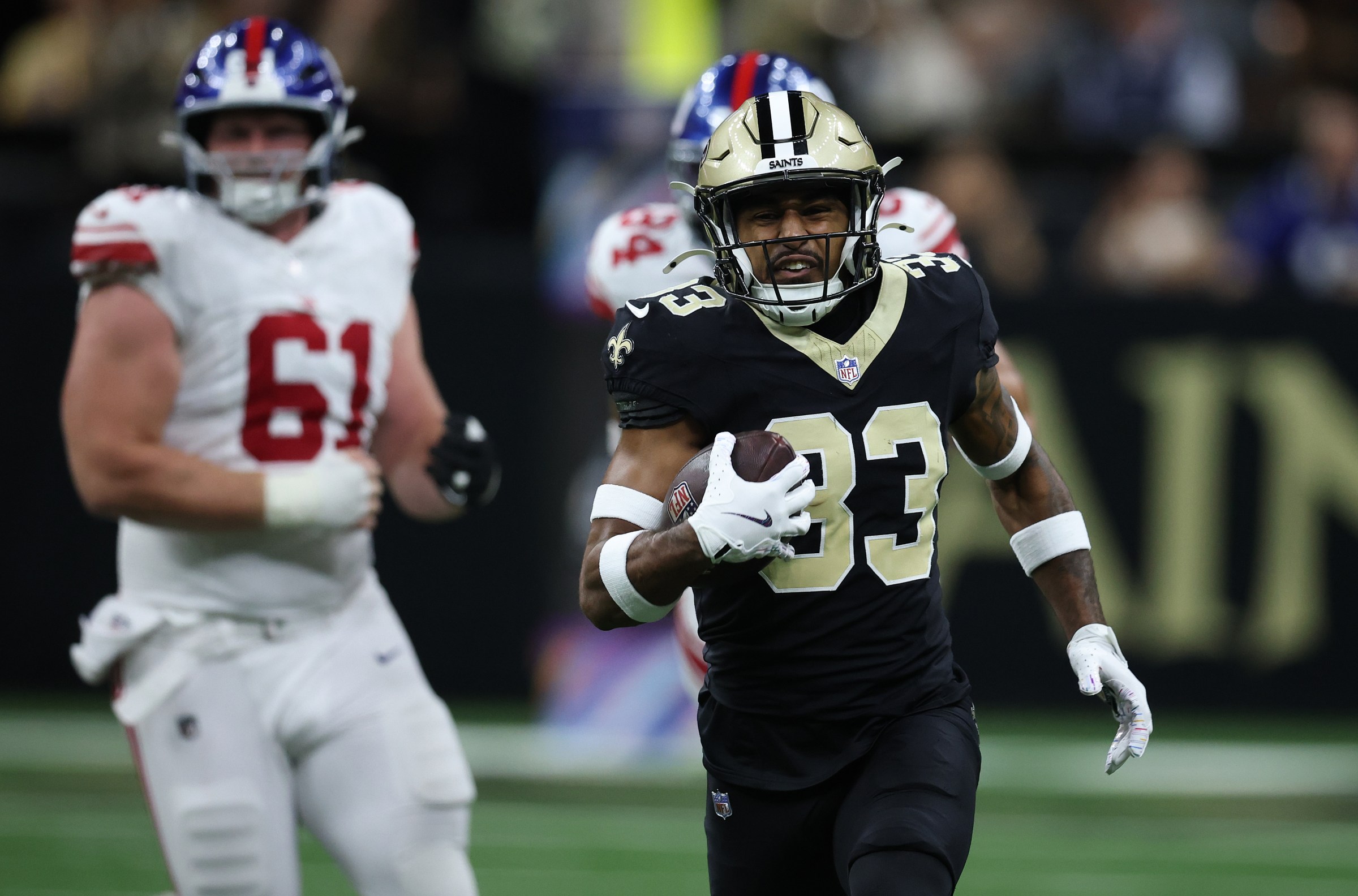 NEW ORLEANS, LOUISIANA - OCTOBER 05: Jonas Sanker #33 of the New Orleans Saints runs with the ball in the game against the New York Giants at Caesars Superdome on October 05, 2025 in New Orleans, Louisiana. (Photo by Chris Graythen/Getty Images)