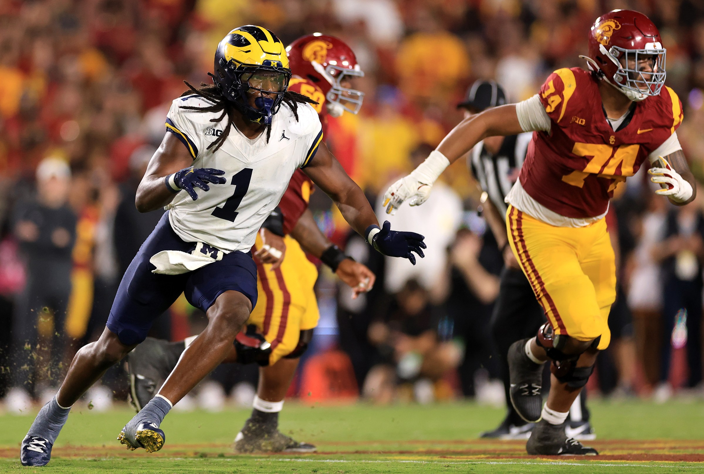 LOS ANGELES, CALIFORNIA - OCTOBER 11: Jaishawn Barham #1 of the Michigan Wolverines in action against the USC Trojans at Los Angeles Memorial Coliseum on October 11, 2025 in Los Angeles, California. (Photo by Luke Hales/Getty Images)